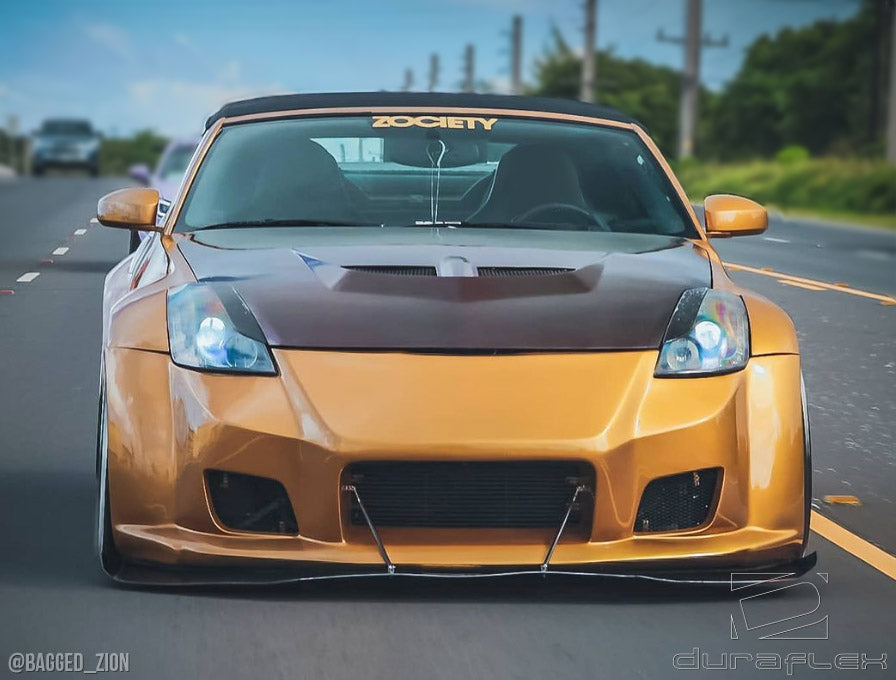 2003-2008 Nissan 350Z Z33 Duraflex B-2 Body Kit - 4 Piece - Includes B-2 Front Bumper Cover (103347) B-2 Side Skirts Rocker Panels (103351) B-2 Rear Bumper Cover (103349)